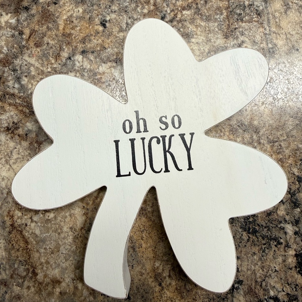White wooden “oh so lucky” shamrock decor